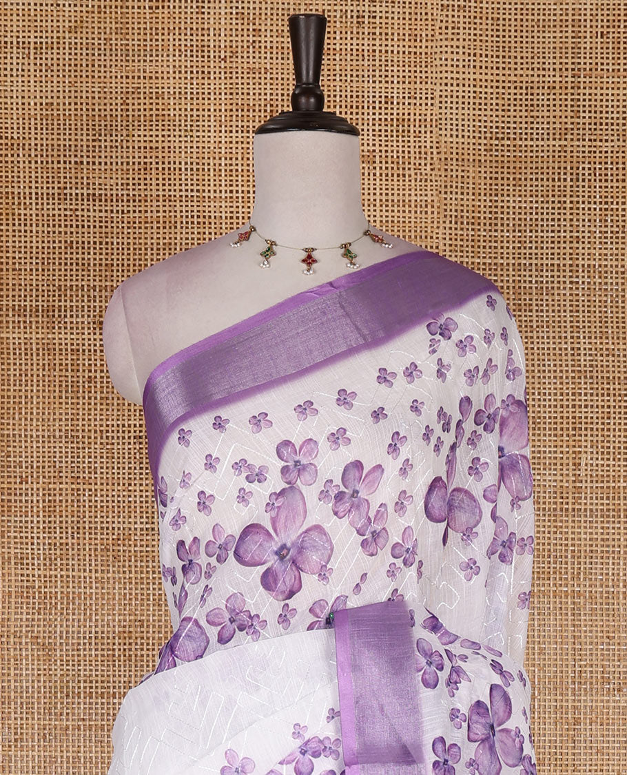 White lilac floral printed with Chikankari-style thread floral embroidered linen cotton saree, contrast zari bavanji border, and blouse of print and embroidery work