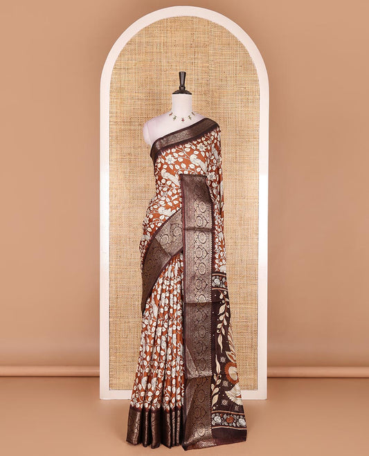 Brown kalamkari floral vine and peacock printed dola silk saree, contrast traditional zari border, peacock printed pallu, and floral vine print blouse