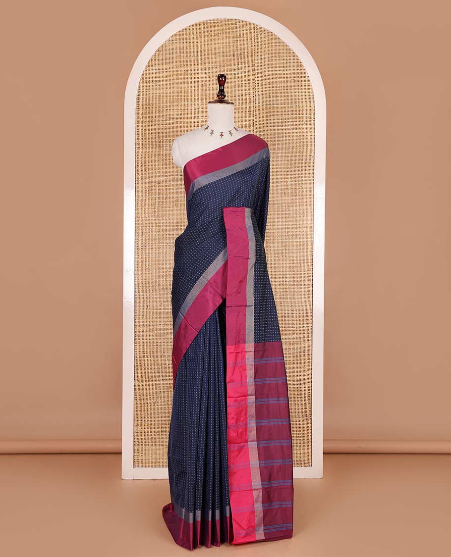 Navy blue-pink plus-shaped buttas steeped semi-soft silk saree, contrast satin border of stripes, striped pallu, and contrast blouse