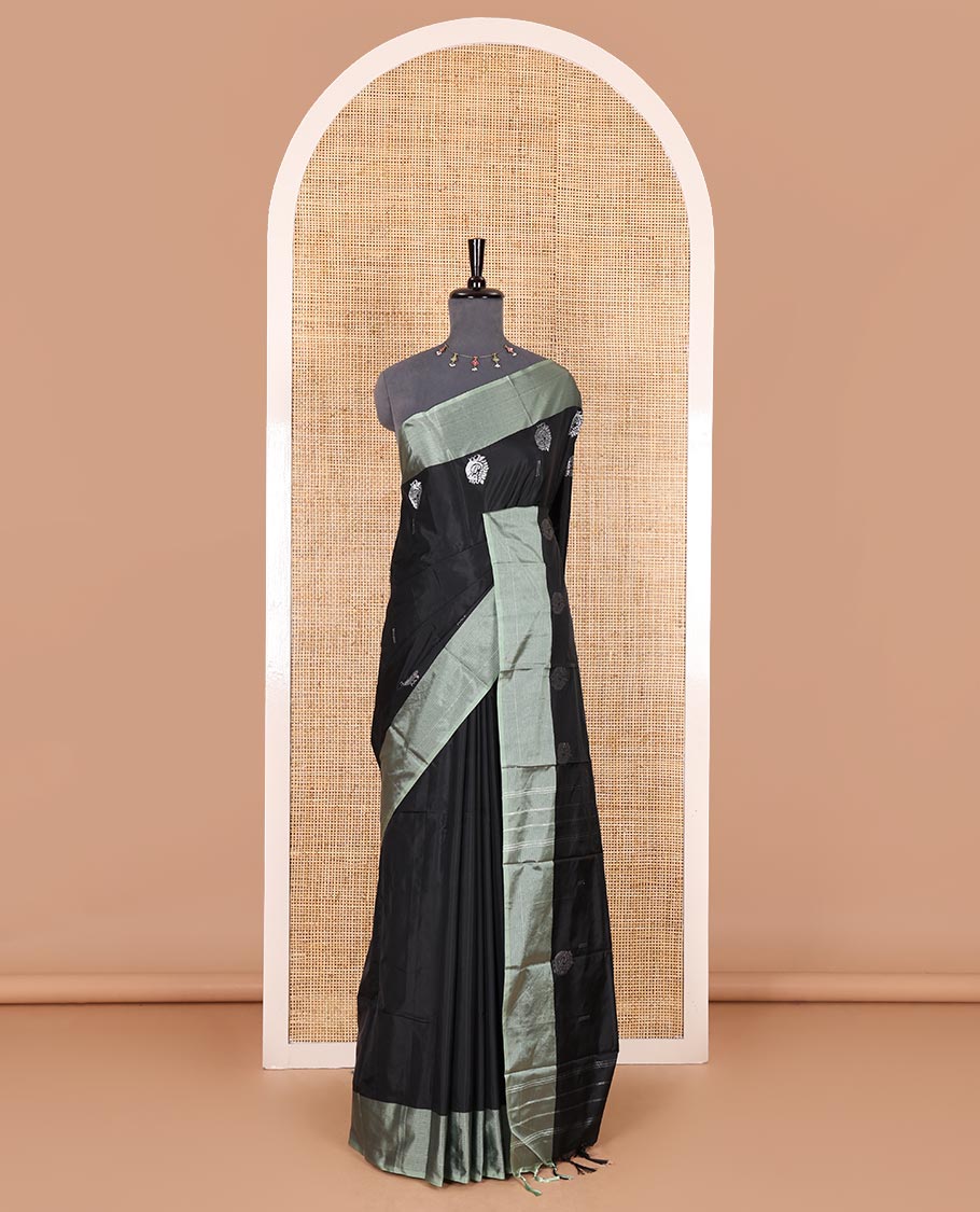 Black buttas and peacock buttas woven Kanchi silk saree, contrast satin zari striped border, zari design pallu, and a matching blouse