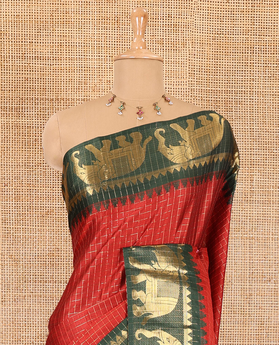 Maroon zari checked semi-taffeta saree, contrast satin temple border of elephant motifs, striped pallu, and a contrast striped blouse