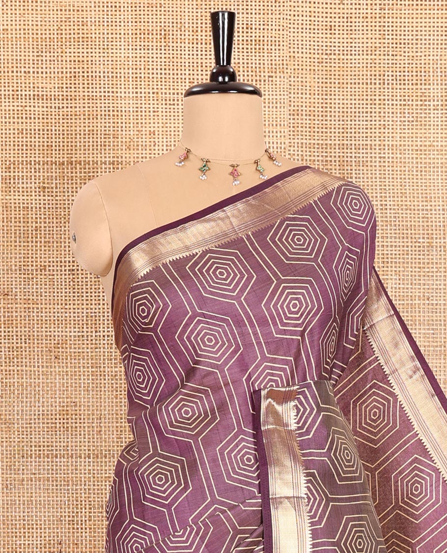 Purple Semi-Tussar Saree Subtly Sparked with Hexagonal Geometric Patterns Printed All Over Its Body, Featuring Traditional Zari Design Border, Gleaming Zari Striped Pallu, and a Matching Blouse