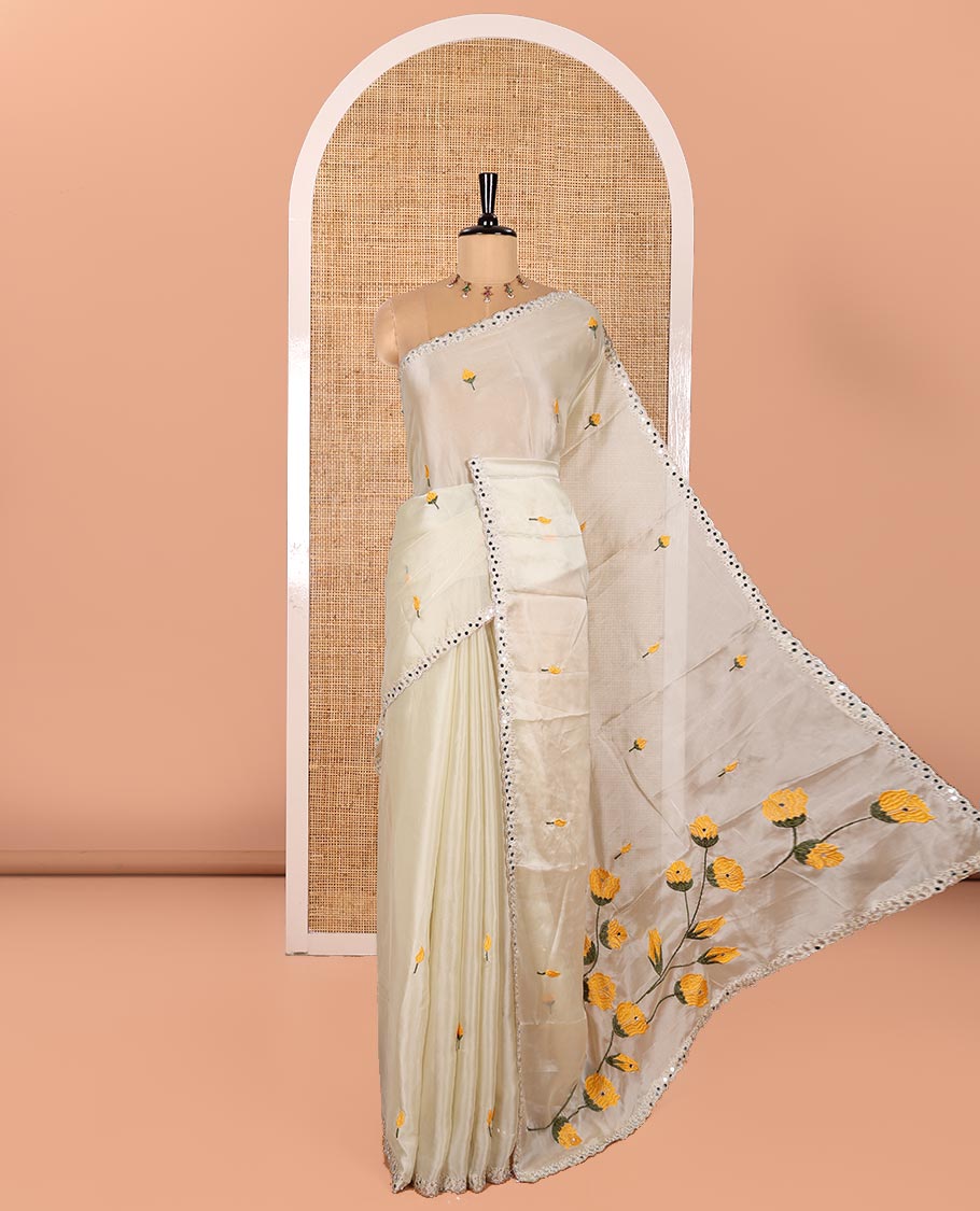 Cream and Yellow Rangoli Saree, Mesmerized with Flower Butta Embroidered All Over Its Body, Scallop Mirror Embroidered Border, Pallu Artfully Woven with Floral Motifs Embroidery, and Paired with a Contrast Embroidered Blouse