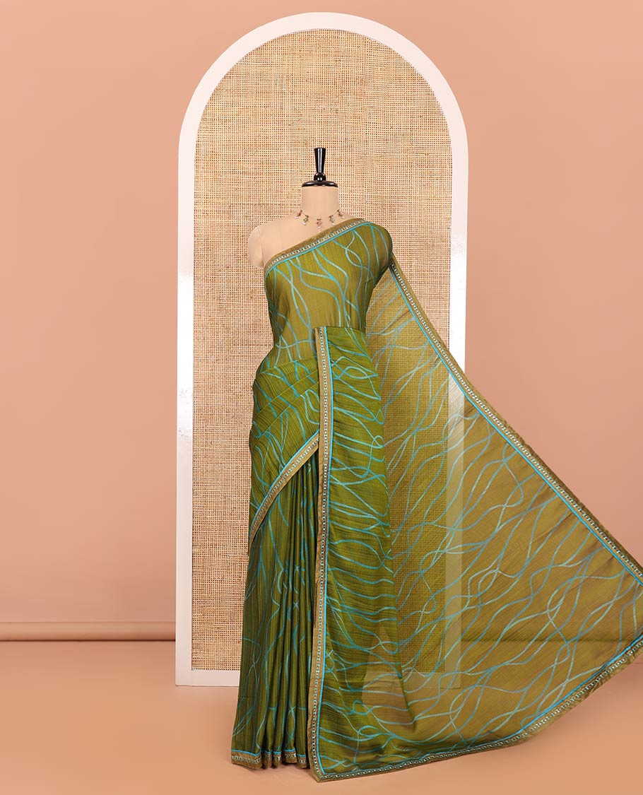 Mehendi Shimmer Chiffon Saree, Elevated with Geometric Patterns on Its Body, Subtle Lace Border, Pallu with the Same Print, and Paired with a Contrast Blouse