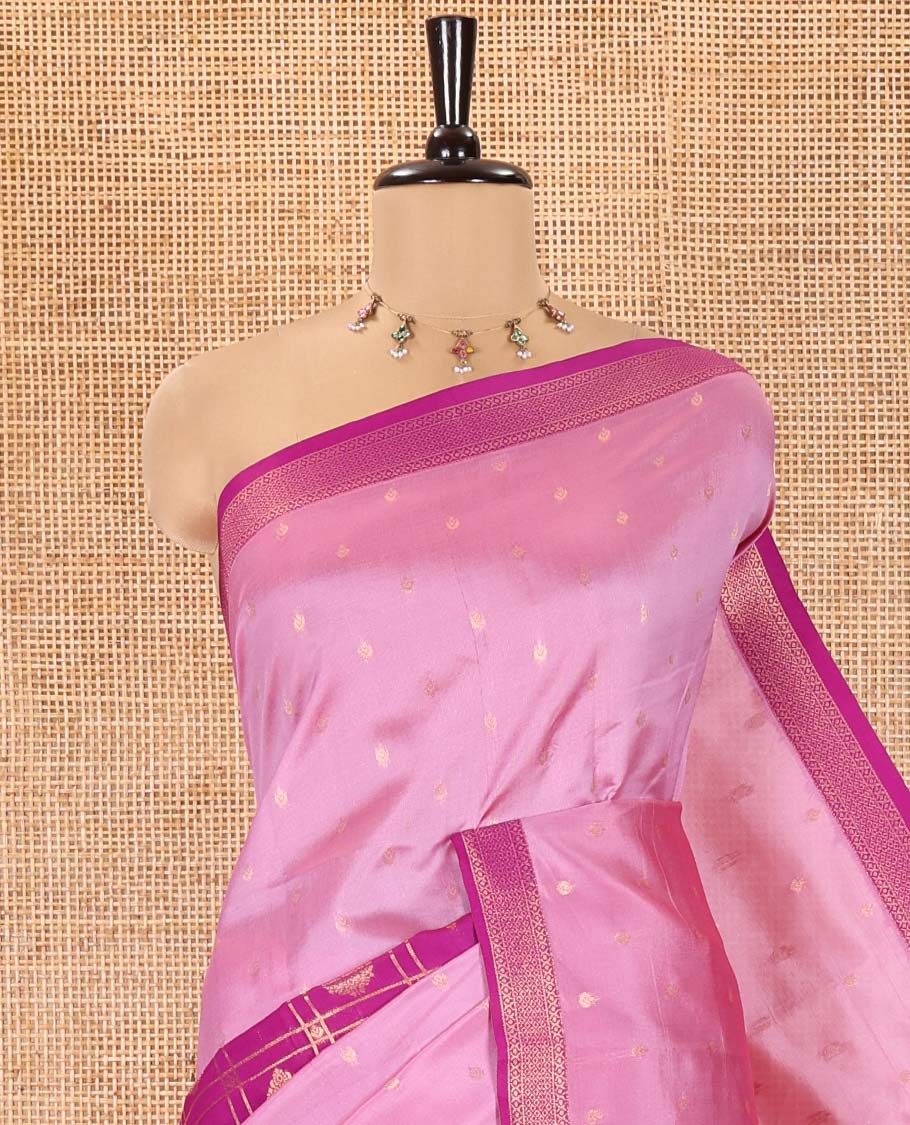 Magenta and Pink Kanchi Silk Saree, Subtly Enriched with Zari Buttas and Buttas Enclosed Checks On Its Body, Complemented by Zari Border, Jaal Pallu, and Paired with a Contrast Jacquard Blouse