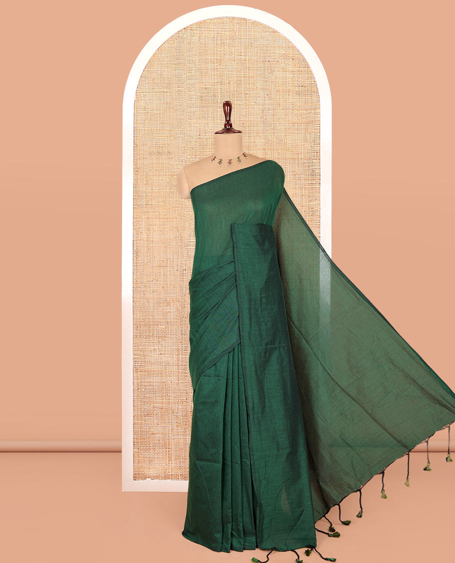 Borderless Green Plain Khadi Cotton Saree, a Self-Pallu with Tassels, and a Matching Blouse