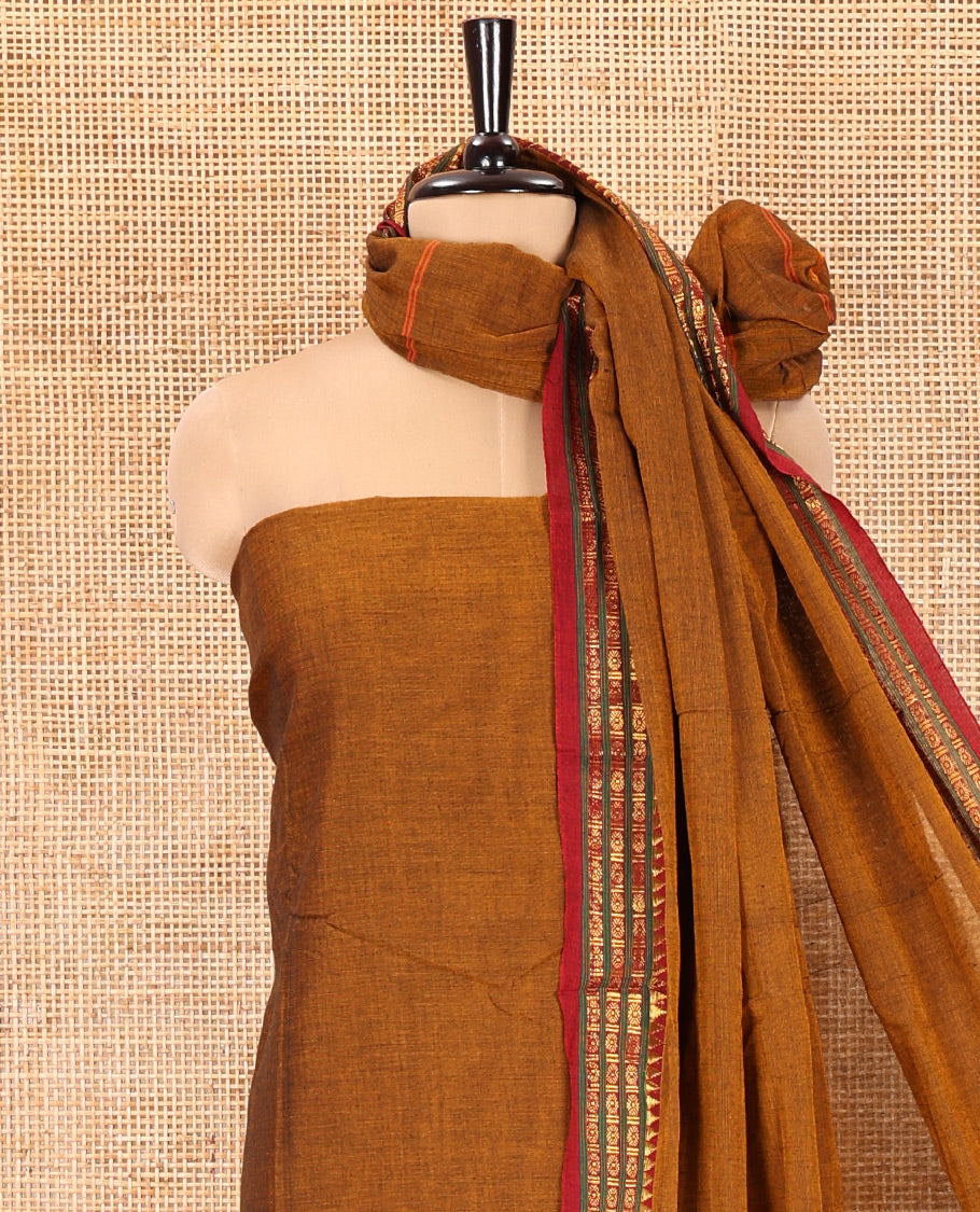 Mustard Mercerised Cotton Material Chudidar Set, Adorned with Rudraksham-Temple Bordered Top, a Mercerised Cotton Bottom, and Paired with a Matching Mercerised Cotton Rudraksham-Temple Bordered Dupatta