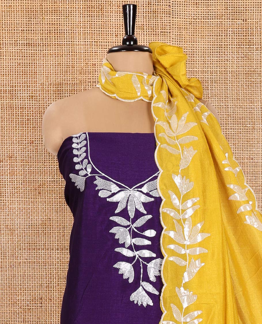 Violet Material Churidar Set, Detailed with Floral Motifs Sequins-Thread Embroidered on Its Vichitra Silk Top, Comes with a Contrast Santoon Bottom, and Paired with a Vichitra Silk Floral Embroidered Scallop Dupatta