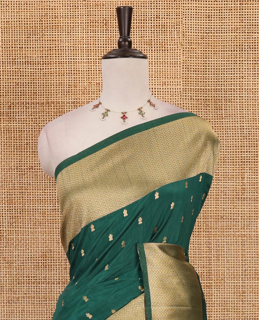 Forest green zari buttas dola silk saree, vanki zari border, checked blouse & pallu of iruthalai pakshi, kuthirai, kili & yaanai designs