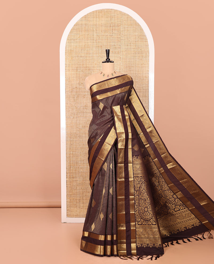 Coffee Brown Kanchipuram Budget Silk Saree Embellished with Zari Buttas and Zari Micro-Checks, Highlighted by Rettai Pettu Traditional Zari Design Border, Intricately Decked Up Pallu of Big Paisley Designs, and Paired with a Matching Blouse