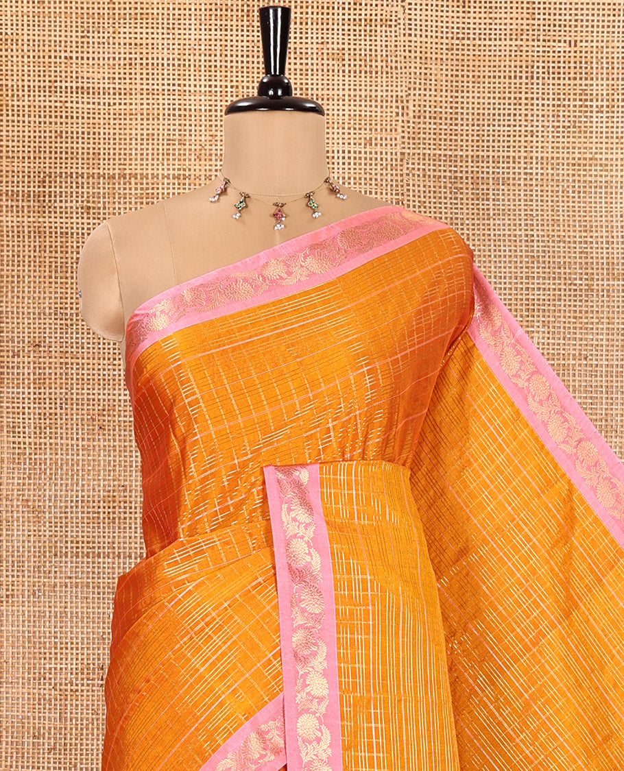 Orange Kanchipuram Budget Silk Saree, Gleamed Up with Zari Checks All Over Its Body, Complemented by a Contrast Floral Creeper Design Zari Border, Pallu Steeped with Floral Designs, and Paired with a Contrast Blouse
