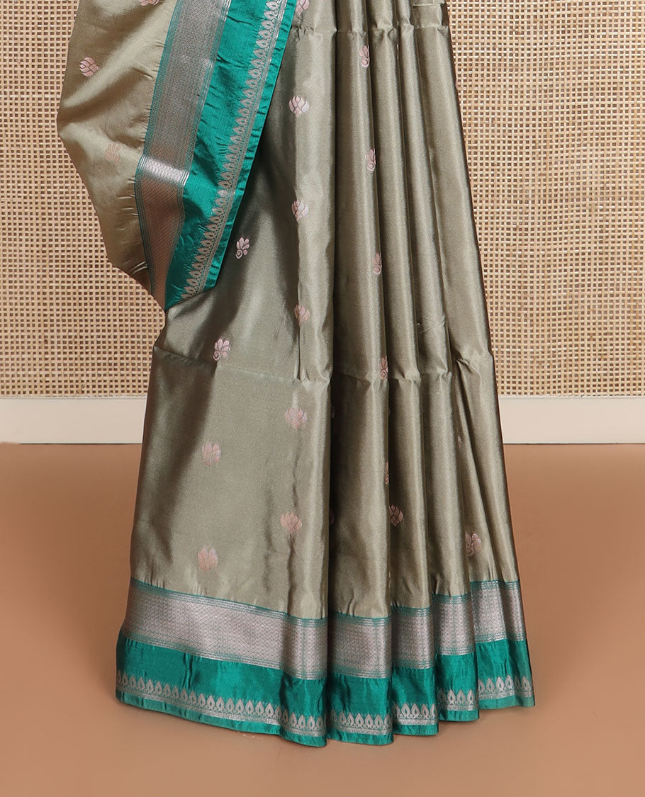Grey zari buttas soft silk saree, contrast traditional zari border, and pallu of chevron design