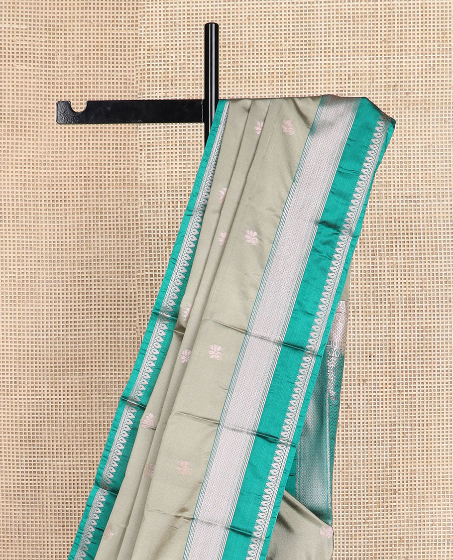 Grey zari buttas soft silk saree, contrast traditional zari border, and pallu of chevron design