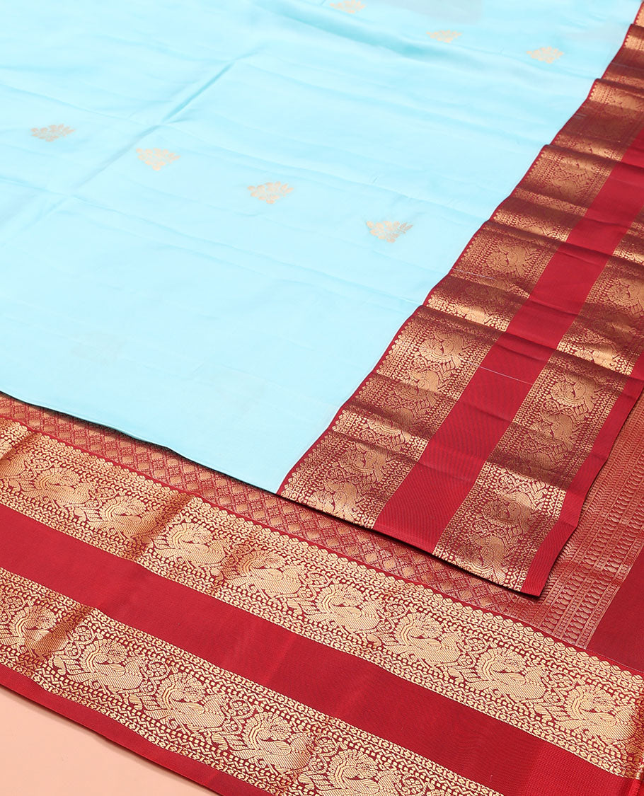Blue Vasundhara Lite-Silk Mix Saree, Gleamed Up with Zari Buttas, Complemented by Contrast Rettai Pettu Border Featuring Diamond, Neli, Muthu, and Mayil Designs, Grandly Woven Pallu of Jaal Designs, and Paired with a Contrast Blouse
