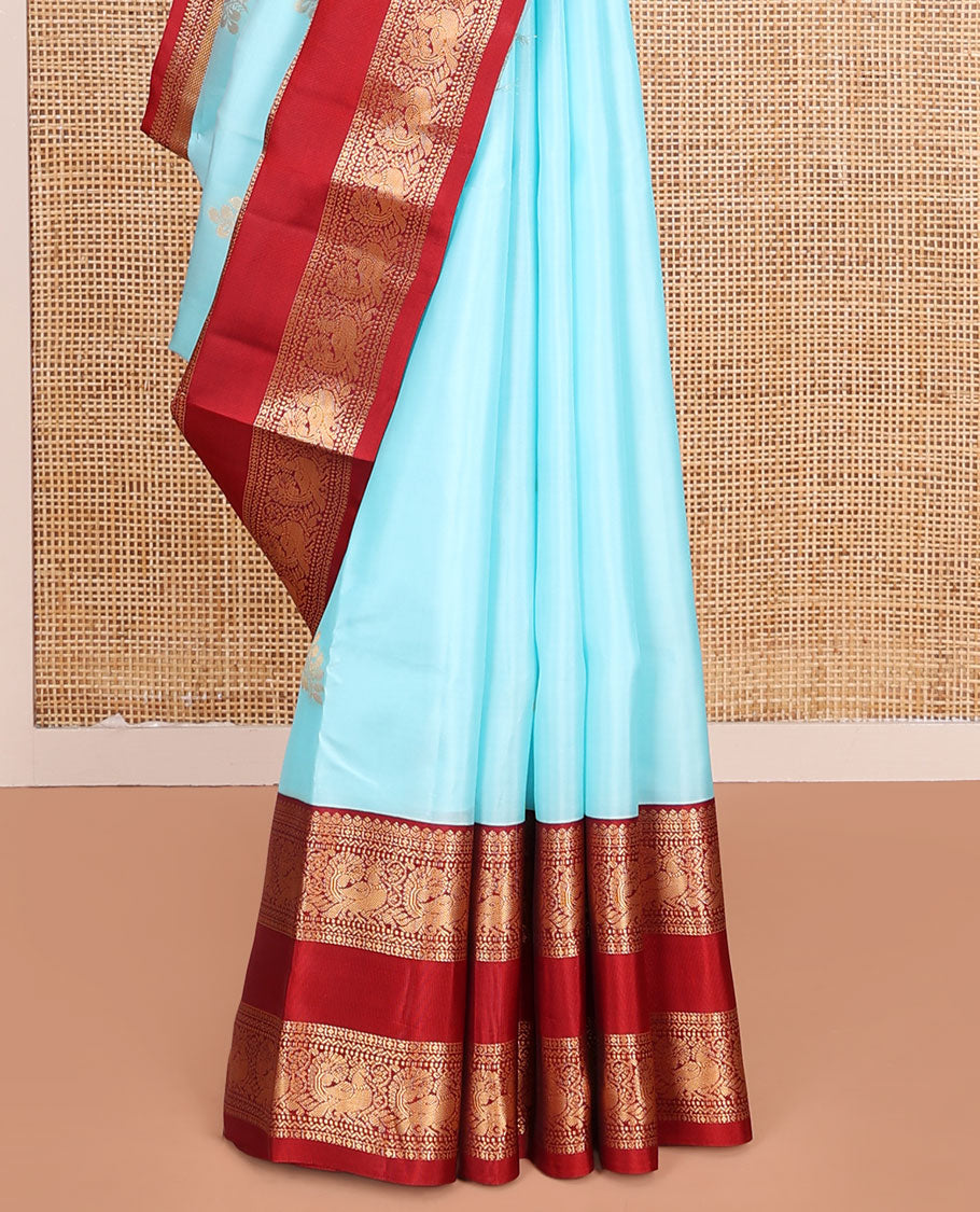 Blue Vasundhara Lite-Silk Mix Saree, Gleamed Up with Zari Buttas, Complemented by Contrast Rettai Pettu Border Featuring Diamond, Neli, Muthu, and Mayil Designs, Grandly Woven Pallu of Jaal Designs, and Paired with a Contrast Blouse