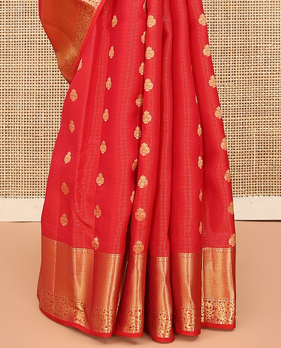 Red Vasundhara Lite Silk Mix Saree, Subtly Sparkled with Zari Buttas and Stripes on Its Body, Highlighted by Zari Border of Rekku, Muthu, and Mayil Designs, Grand Jaal Pallu, and Paired with a Matching Blouse