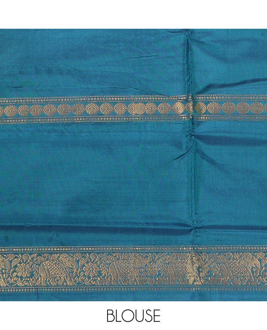 Orange jacquard banana pith saree, contrast traditional zari border, and striped pallu