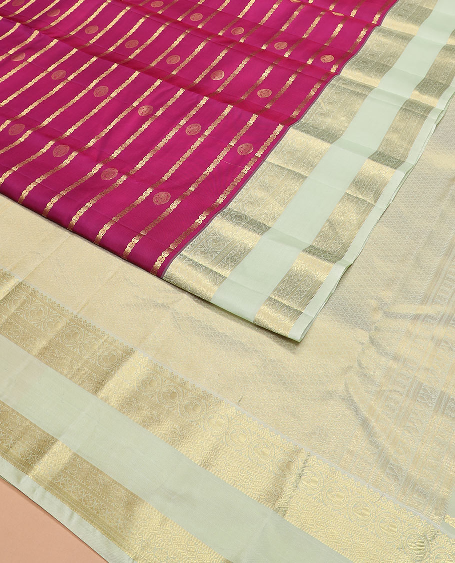 Pink zari design silk saree with contrast rettai pettu border of round mayil, muthu, neli, and diamond designs, and intricate pallu