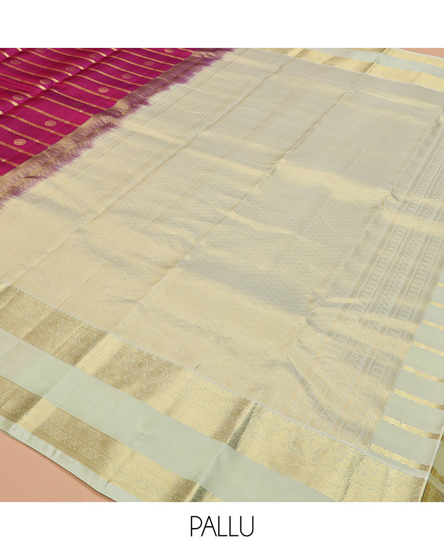 Pink zari design silk saree with contrast rettai pettu border of round mayil, muthu, neli, and diamond designs, and intricate pallu
