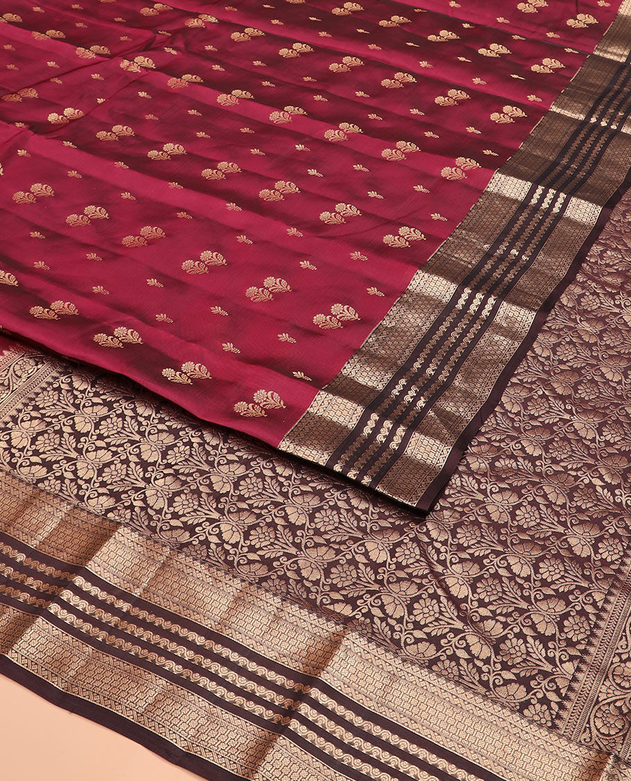 Light Maroon Vasundhara Silk Saree Gracefully Embellished with Zari Buttas, Complemented by a Contrast Border of Geometric Designs, Majestically Detailed Pallu of Floral Jaal Designs, and a Contrast Blouse