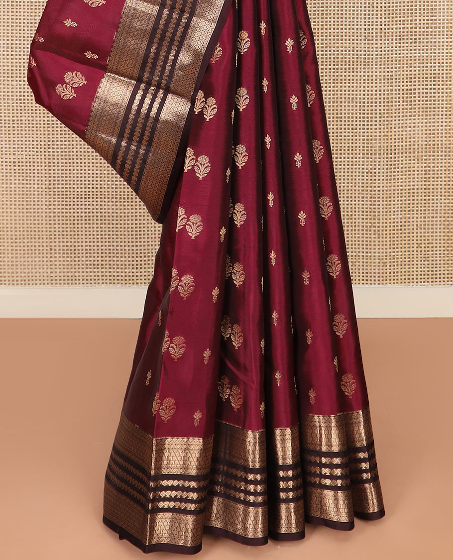 Light Maroon Vasundhara Silk Saree Gracefully Embellished with Zari Buttas, Complemented by a Contrast Border of Geometric Designs, Majestically Detailed Pallu of Floral Jaal Designs, and a Contrast Blouse