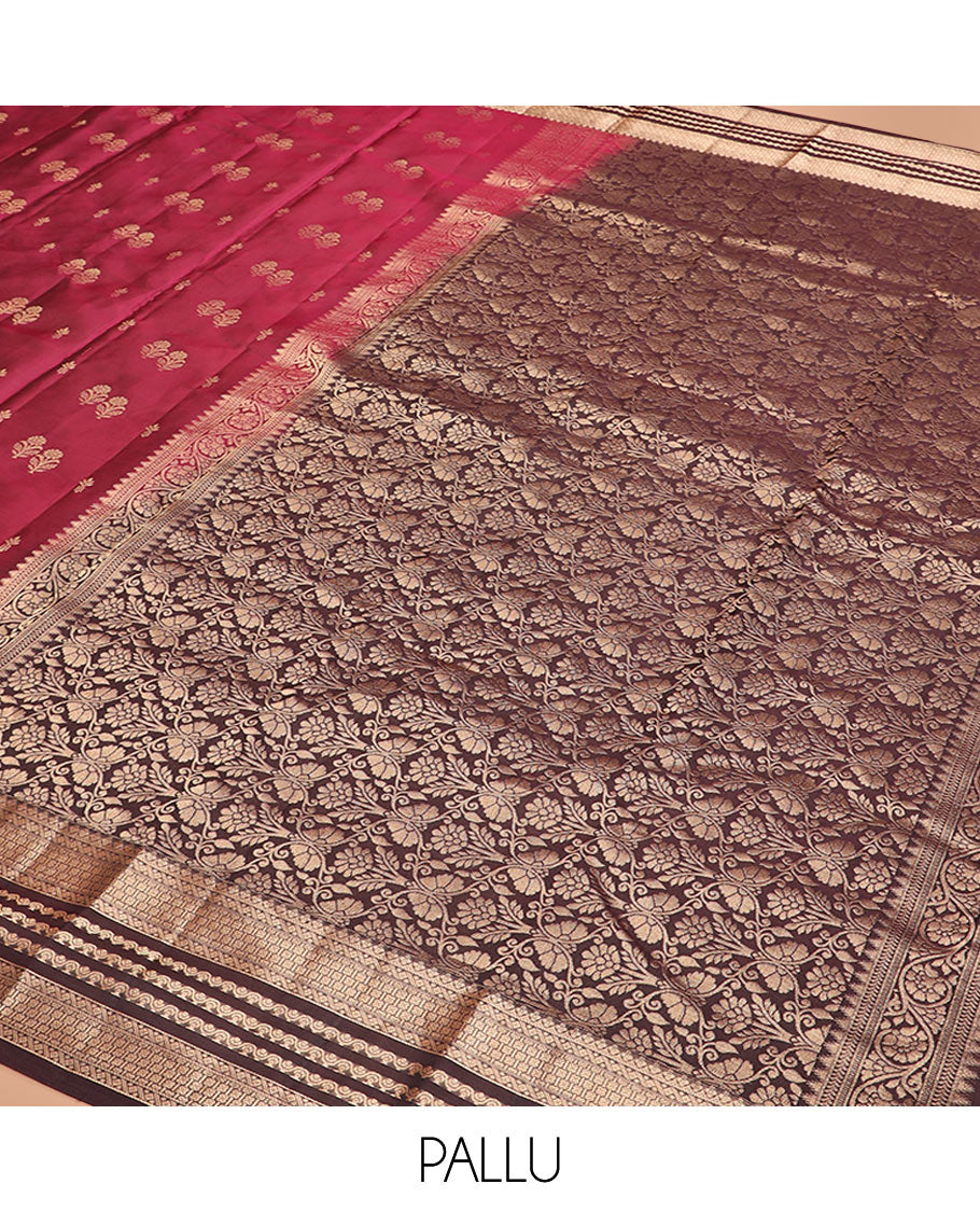 Light Maroon Vasundhara Silk Saree Gracefully Embellished with Zari Buttas, Complemented by a Contrast Border of Geometric Designs, Majestically Detailed Pallu of Floral Jaal Designs, and a Contrast Blouse