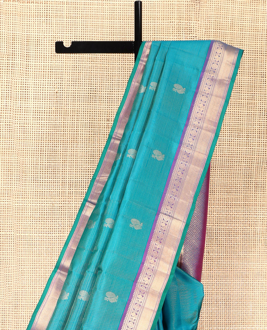 Blue Vasundhara Silk Saree, Embellished with Mayil-Chakra Buttas, Complemented by a Contrast Border of Rekku, Muthu, Kathir, Mayil, Chakram, and Mayil Kann, Jaal Pallu, and a Contrast Blouse