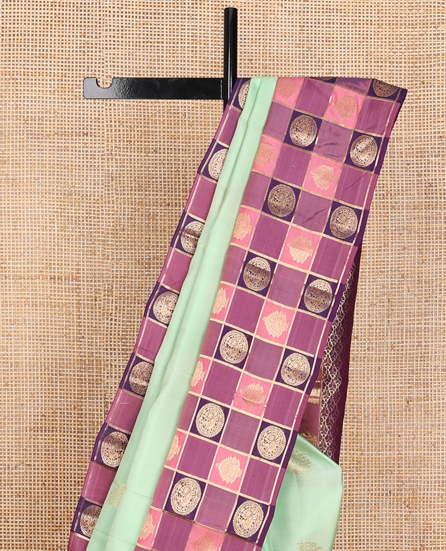 Green zari buttas silk saree, contrast multi-color checked border of zari motifs & zari-rich grand jaal pallu