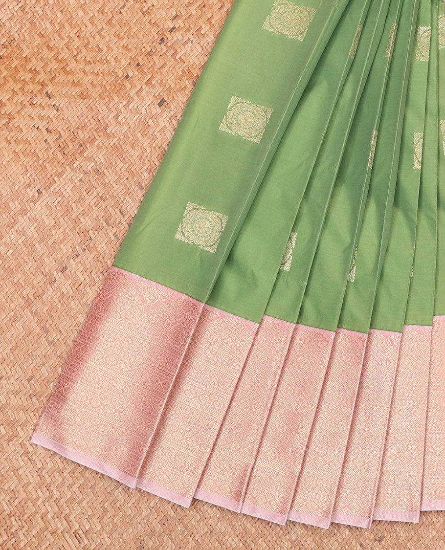 Green Budget Silk Saree Adorned with Square-Shaped Zari Buttas, Complemented by a Contrast Traditional Zari Design Woven Border, Pallu Steeped with Geometric Zari Designs, and Paired with a Contrast Blouse