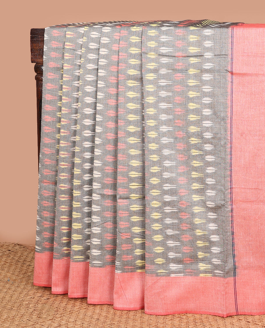 Grey buttas ikkat cotton saree, contrast plain peach border, and pallu of buttas