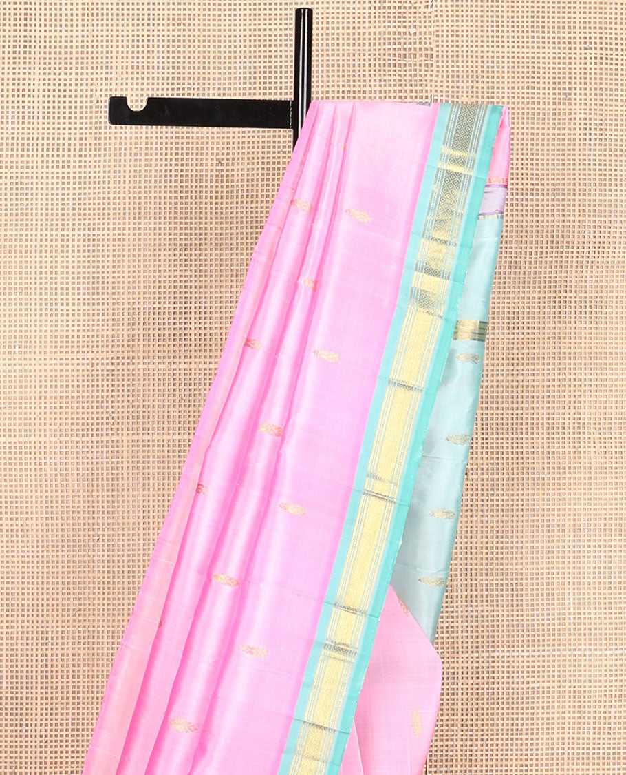 Pink kanchipuram silksaree with zari buttas, contrast one-sided zari border of Banaras, muthu & mayil kann & pallu of zari design