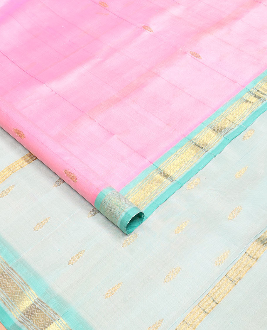 Pink kanchipuram silksaree with zari buttas, contrast one-sided zari border of Banaras, muthu & mayil kann & pallu of zari design