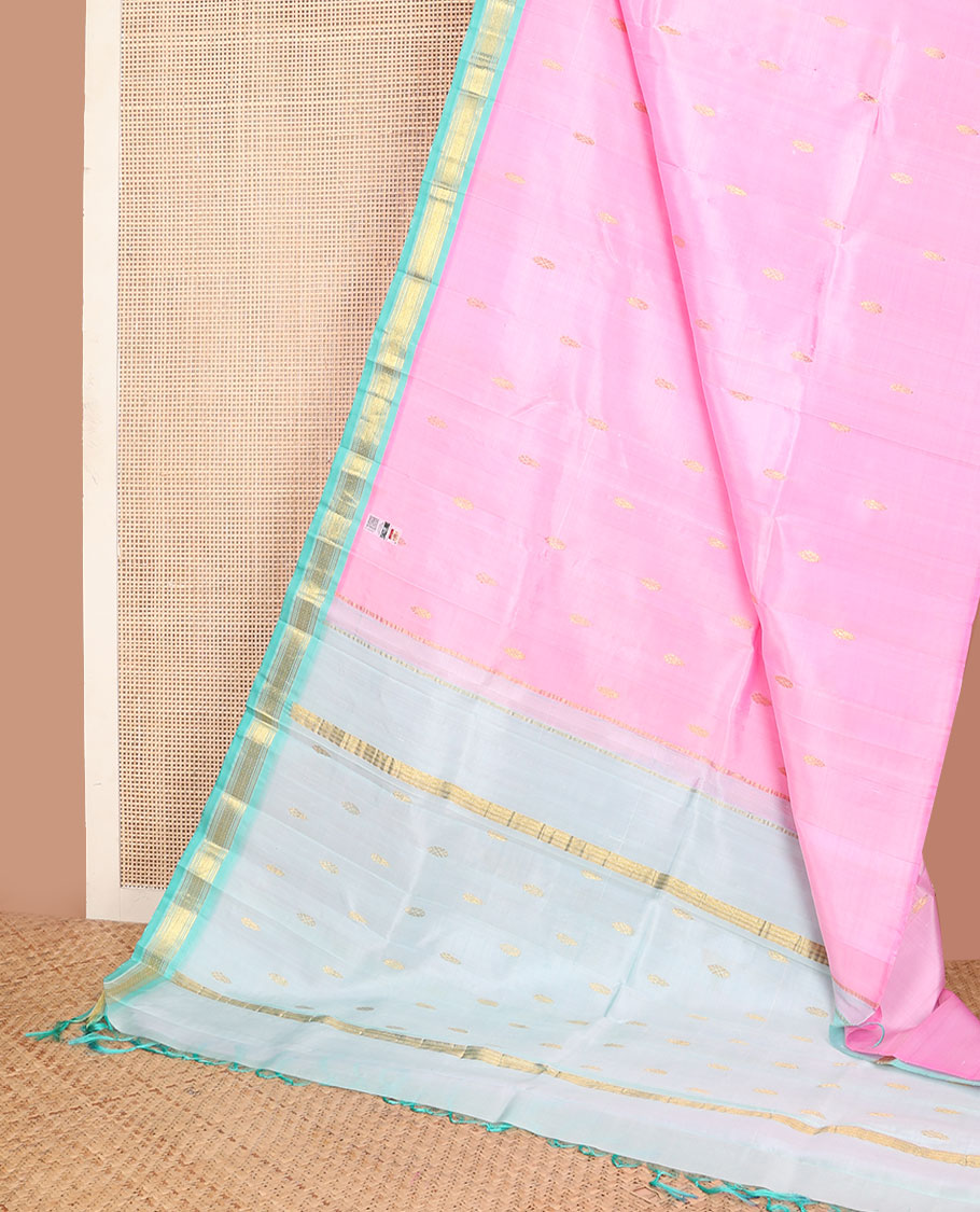 Pink kanchipuram silksaree with zari buttas, contrast one-sided zari border of Banaras, muthu & mayil kann & pallu of zari design