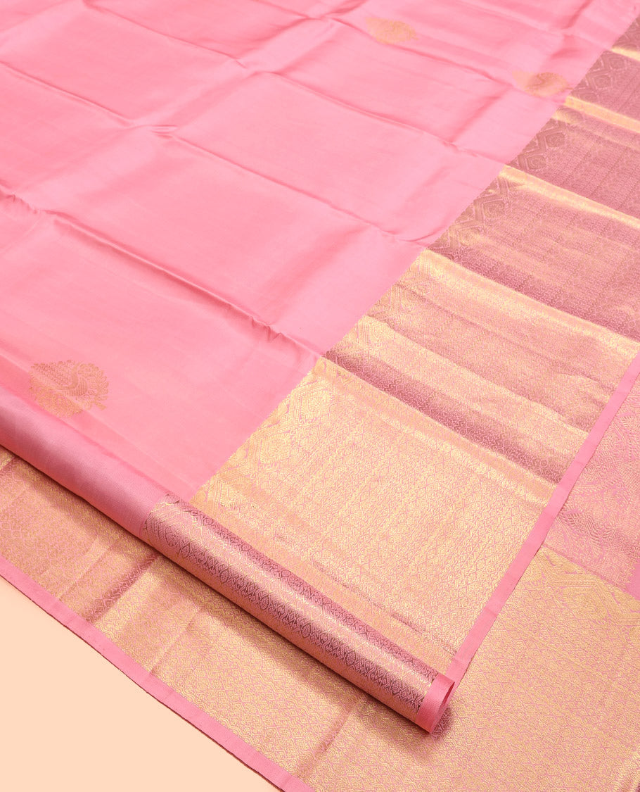 Pink Kanchipuram Silk Saree, Enthralled with Zari Buttas All Over Its Body, Highlighted by a Zari Border of Traditional Designs, Grand Jaal Pallu, and Paired with a Matching Blouse