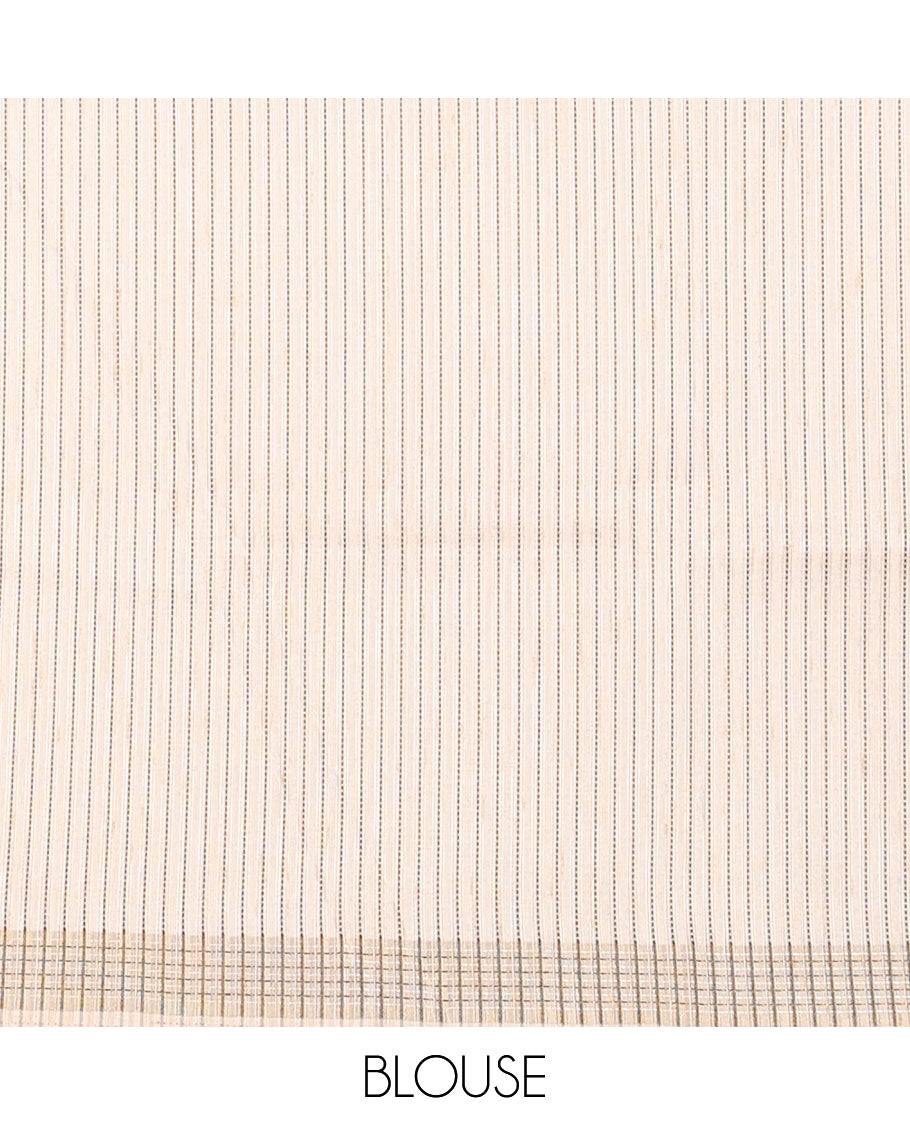 Cream printed tussar saree mirrors the peacock on the floral vine design and has a zari border and zari striped pallu
