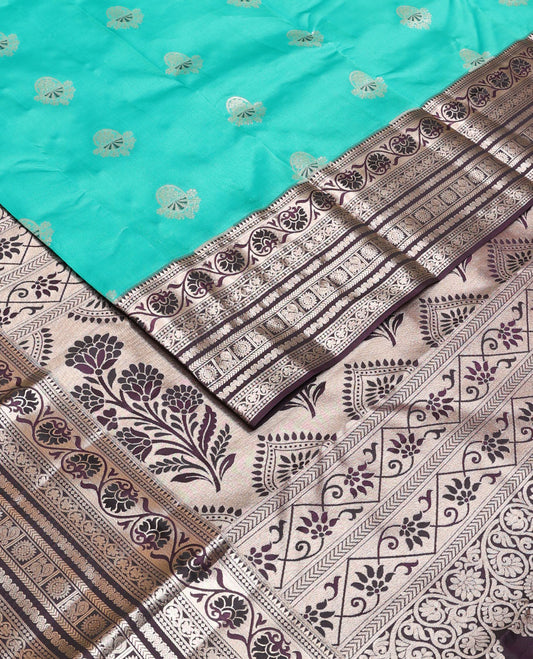 Light blue zari buttas Vasundhara silk mix saree, contrast temple border of kodi visiry, kathir & Annam chakram & intricate pallu