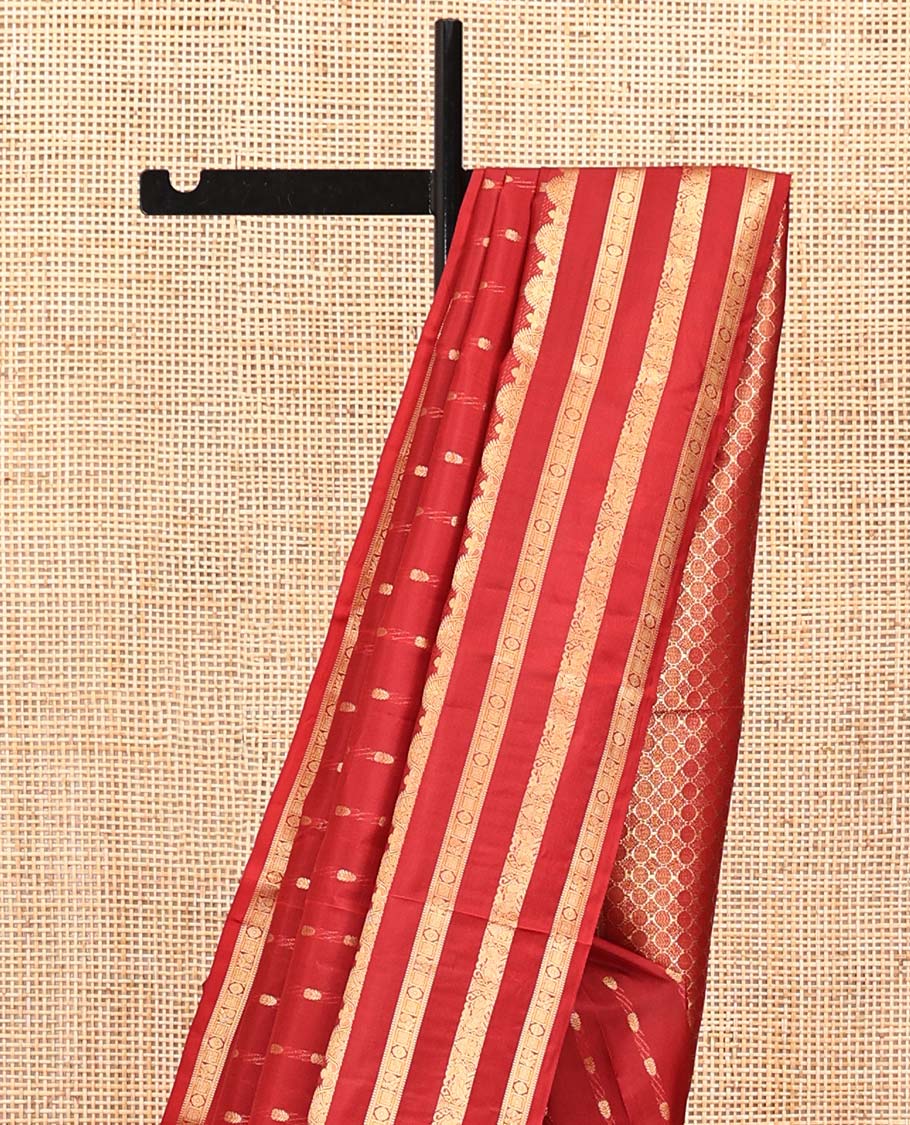 Rust Vasundhara Silk Mix Saree, Beautified with Zari Buttas All Over Its Body, Highlighted by Varisai Pettu Border of Mayil, Laddu Kamalam, and Yaali Designs, Grand Pallu and Paired with a Matching Blouse