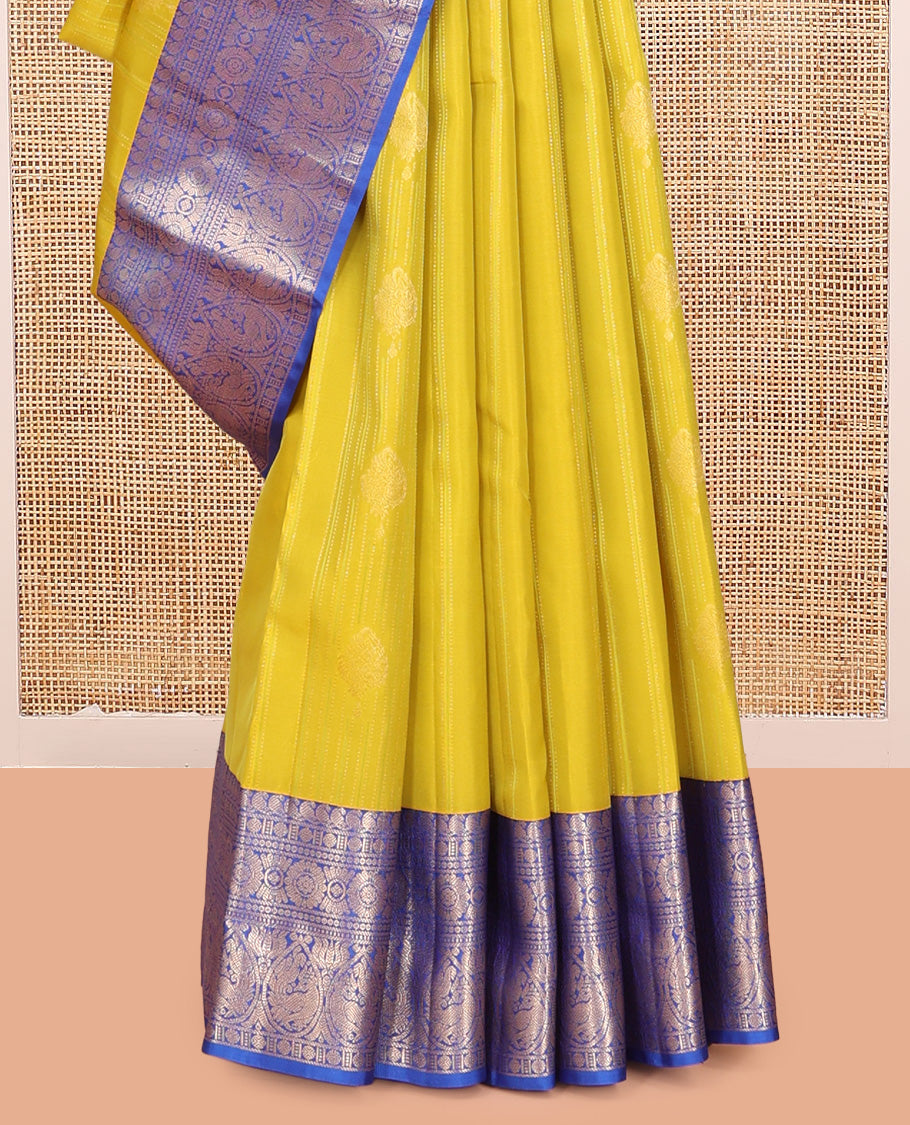 Green Vasundhara Lite Silk Mix Saree, Decked Up with Zari Designs, a Contrast Border of Manga Mokku, Rudraksham, Chakram, and Mayil Designs, Grand Pallu, and a Contrast Blouse
