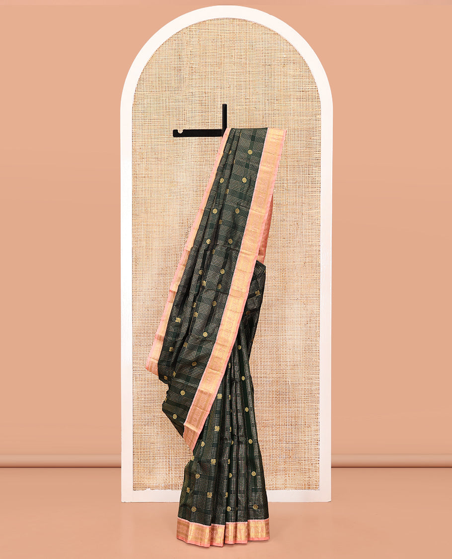 Green Vasundhara Silk Saree, Gracefully Embellished with Zari Butta Enclosed Checks All Over Its Body, Complemented by a Contrast Border of Banaras, Vanki, and Mayil Designs, Grand Pallu, and Paired with a Contrast Blouse