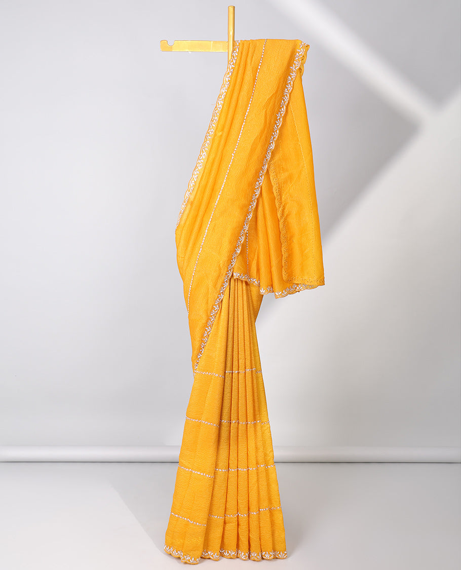 Orange zig-zag stripes embroidered designer saree, scallop stone embroidered border