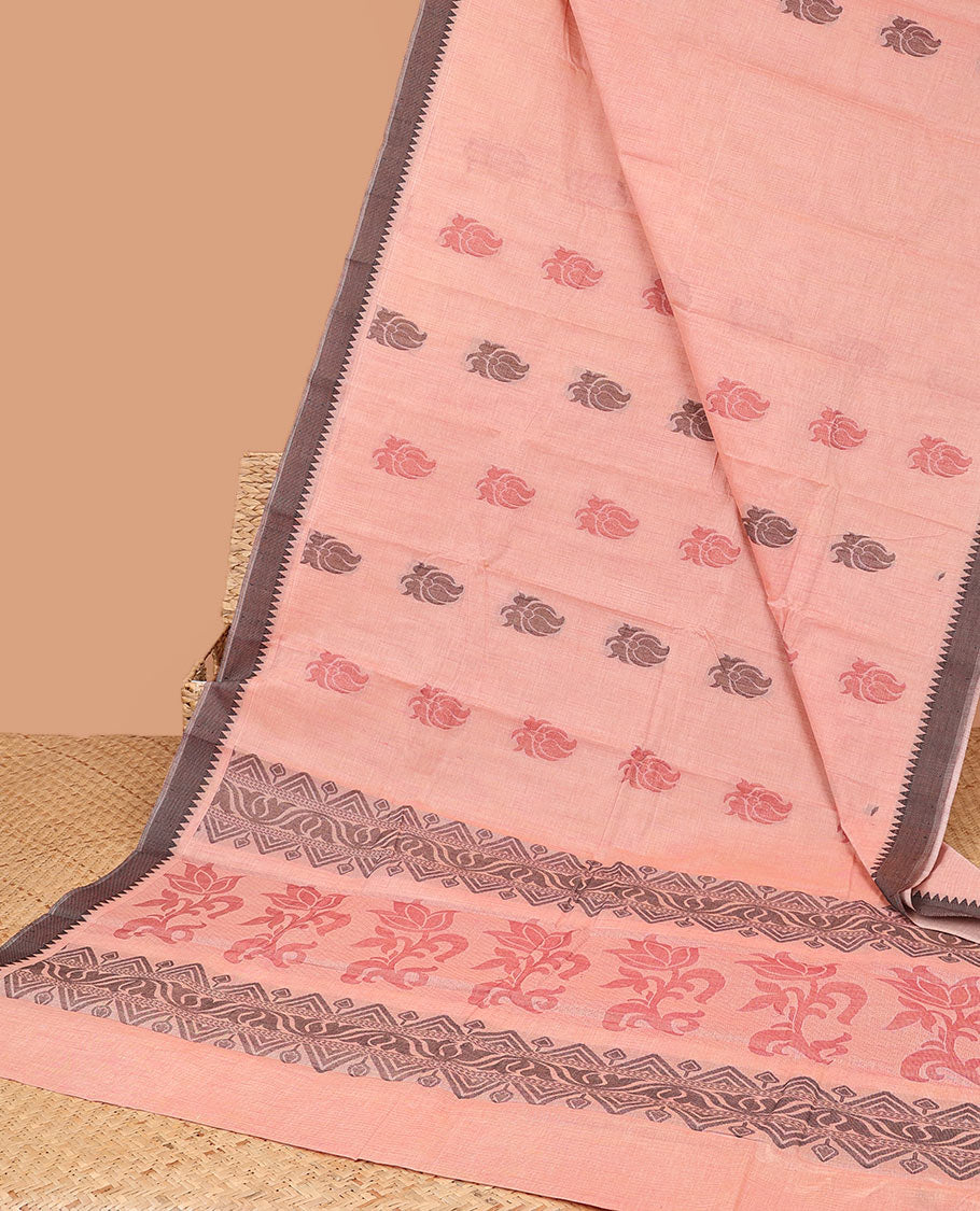 Peach kanchi cotton saree with paisley buttas, contrast temple border & pallu of floral & geometric designs