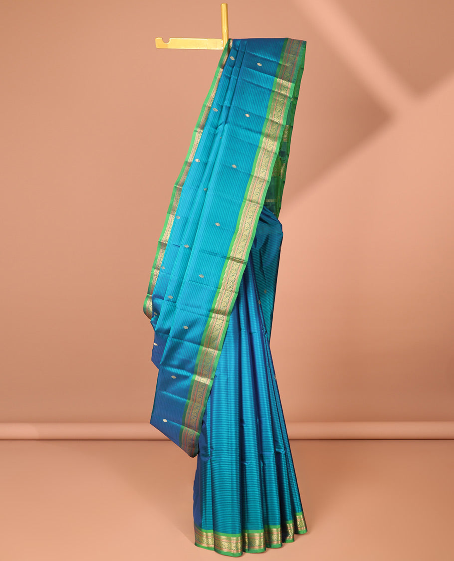 Peach zari buttas Vasundhara Lite Silk Mix Saree, contrast border of thilakam mokku, manga, mayil, neli, thazampoo rekku, and muthu designs, and jaal pallu main image 1
