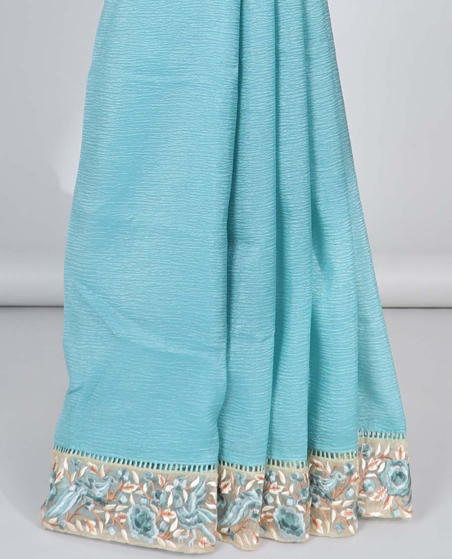 Blue plain design crushed tissue saree, contrast floral & bird embroidery border