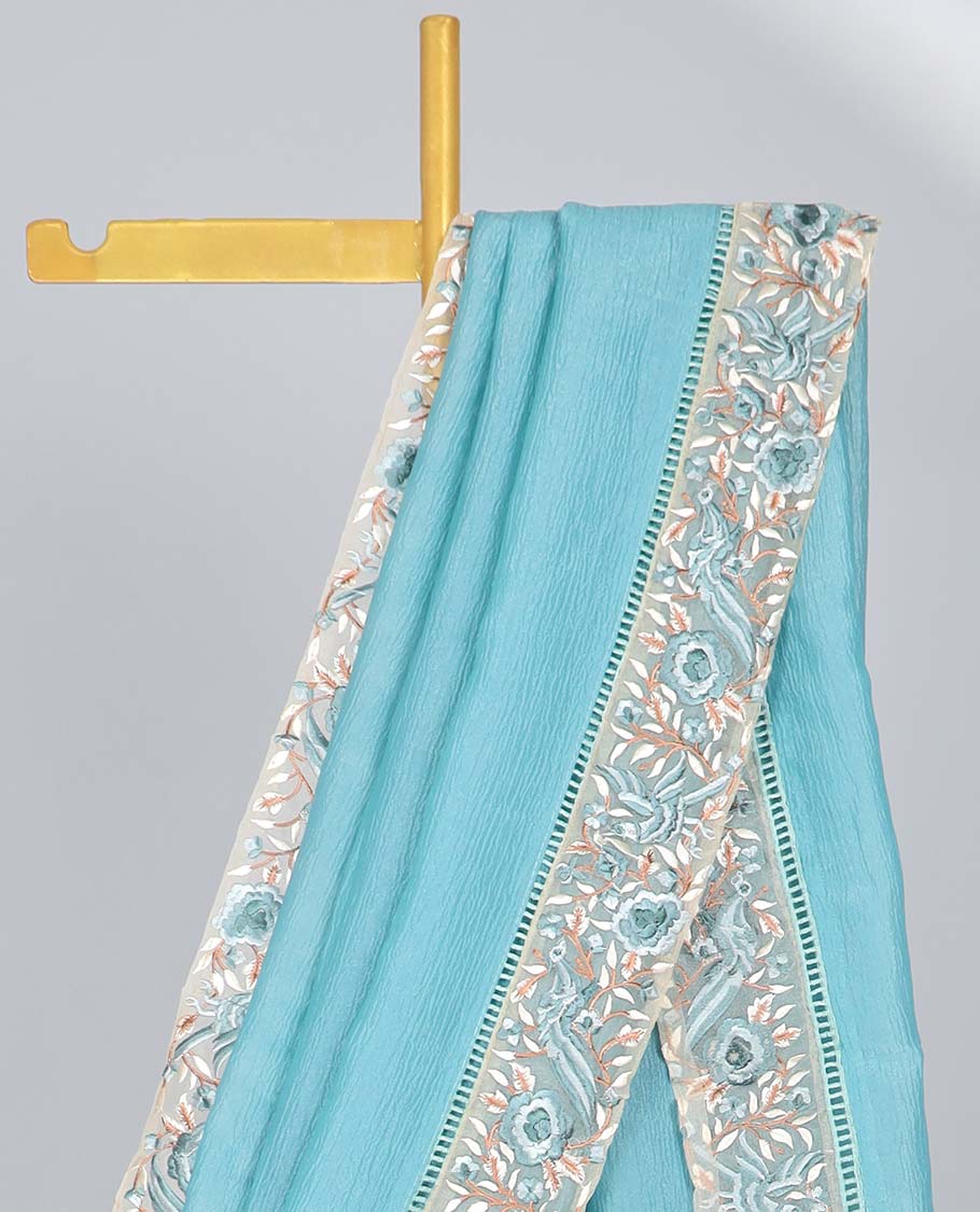 Blue plain design crushed tissue saree, contrast floral & bird embroidery border