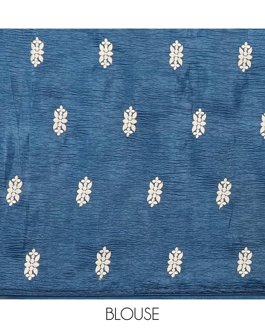 Borderless green crushed tissue saree with buttas & pichwai cow buttas, intricate pallu