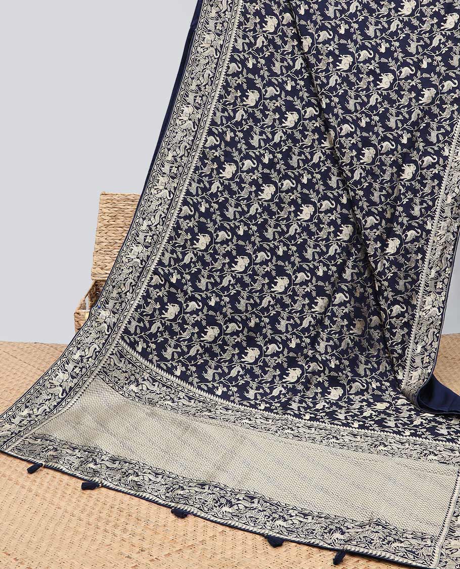 Blue floral & animal jacquard semi-banaras dola silk saree, floral & animal designs & chevron design pallu