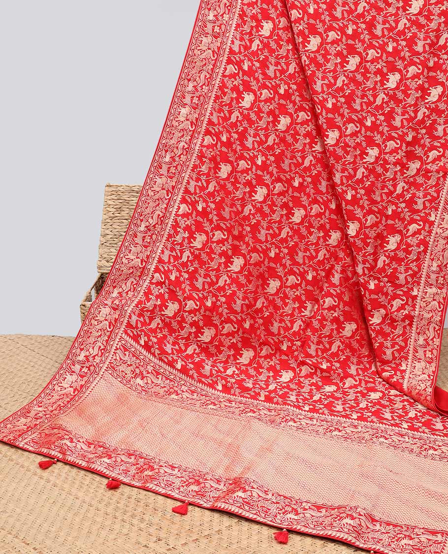 Blue floral & animal jacquard semi-banaras dola silk saree, floral & animal designs & chevron design pallu