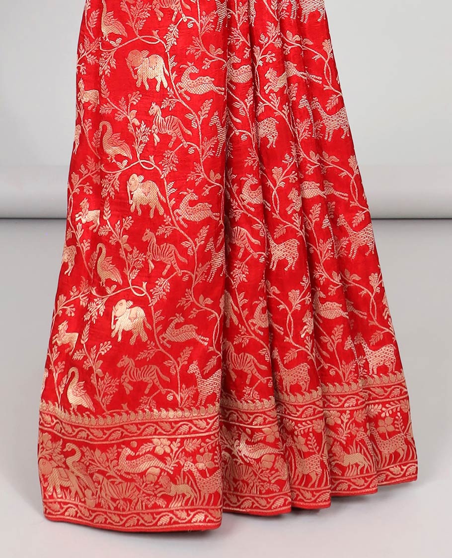 Blue floral & animal jacquard semi-banaras dola silk saree, floral & animal designs & chevron design pallu