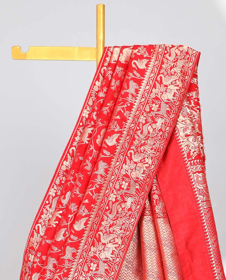 Blue floral & animal jacquard semi-banaras dola silk saree, floral & animal designs & chevron design pallu