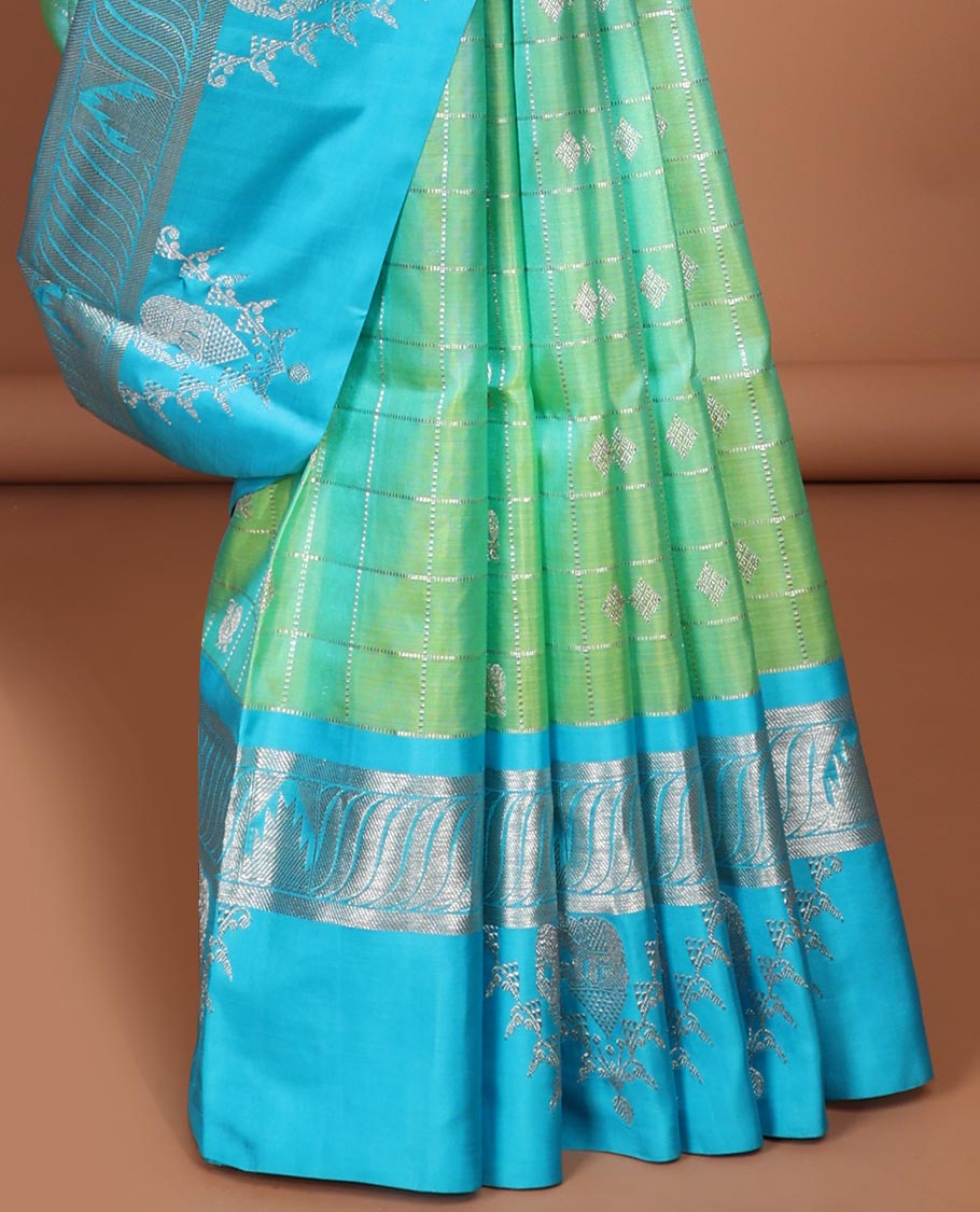 Green buttas enclosed checked Vengatagiri silk saree, contrast zari design border & pallu of jaal designs